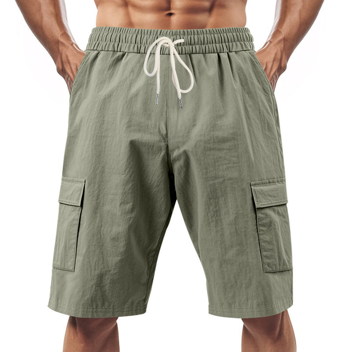 Men's technical cargo shorts with elastic drawstring waistband, secure flap pockets, and quick-drying functional material StylebySassy