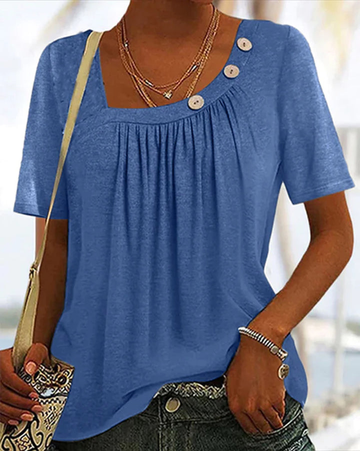 Women's boxy short-sleeve shirt with square neckline, gathered bust area and decorative button detail StylebySassy