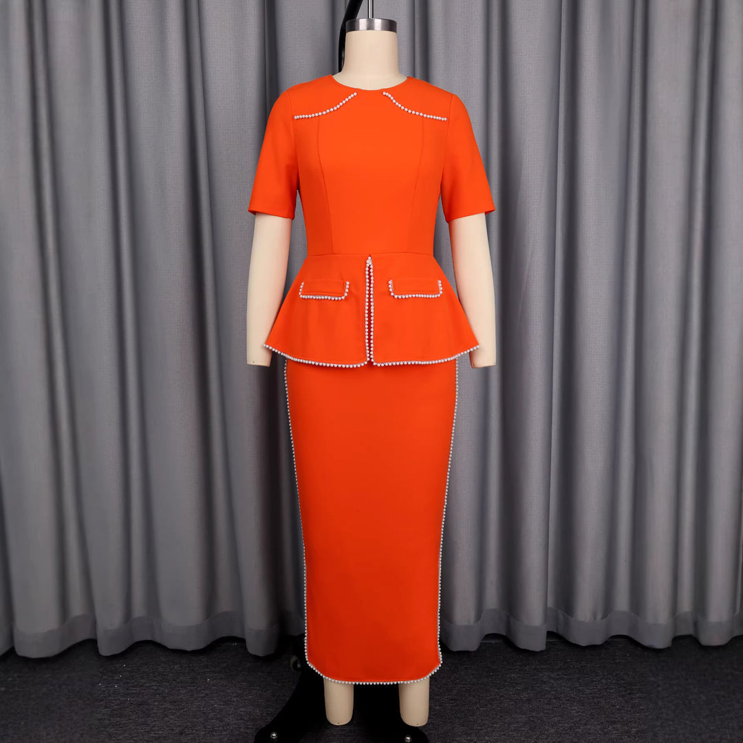 Women's elegant dress with decorative collar and pearl-embellished details StylebySassy