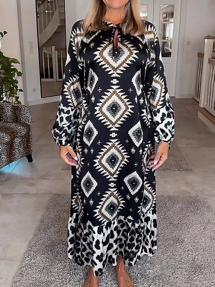 Women's flowing maxi dress with ethnic diamond print, keyhole neckline and contrast ruffle StylebySassy