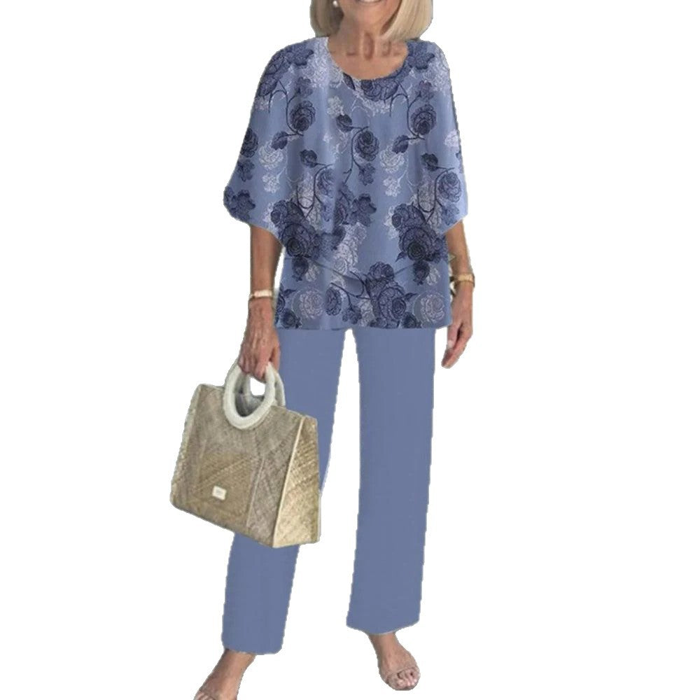 Women's layered tunic with cape sleeves and ankle-length straight leg pants with graphic print StylebySassy