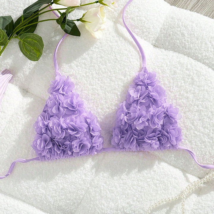 Women's bikini top with floral 3D appliqués StylebySassy