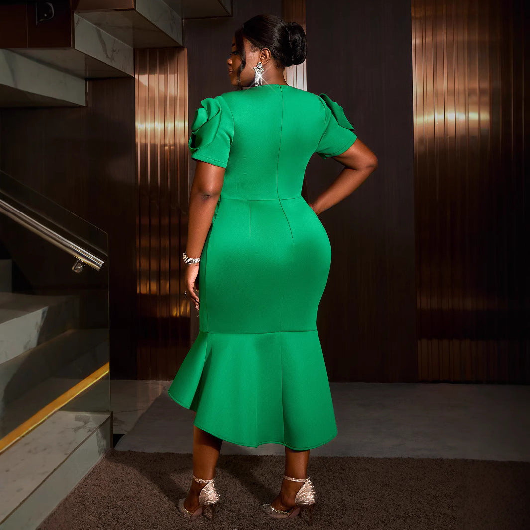 Women's fitted dress with voluminous sleeves and tailored belt detail StylebySassy