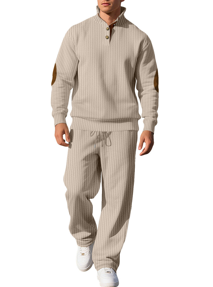Men's fine ribbed sweater with half button placket, high stand-up collar, and contrasting suede elbow patches StylebySassy