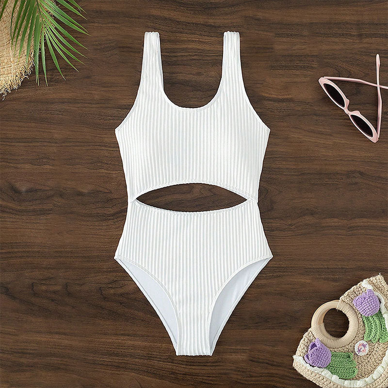 Women's one-piece swimsuit with modern cut-out and textured design StylebySassy