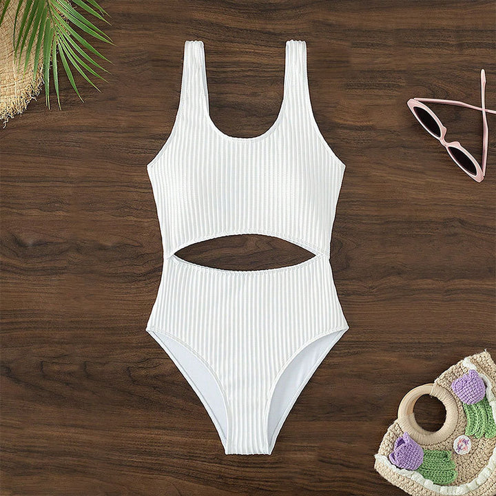 Women's one-piece swimsuit with modern cut-out and textured design StylebySassy