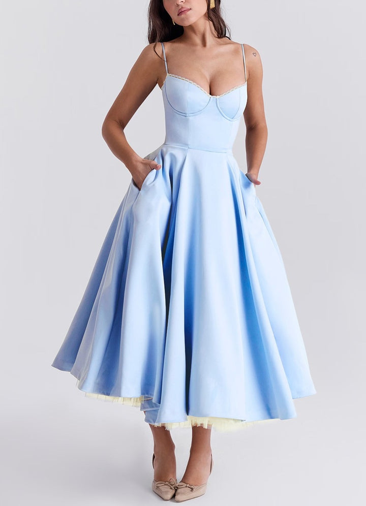 Ladies nan bustier dress with shaped bodice, soft flared skirt, integrated tulle underlay and side pockets StylebySassy