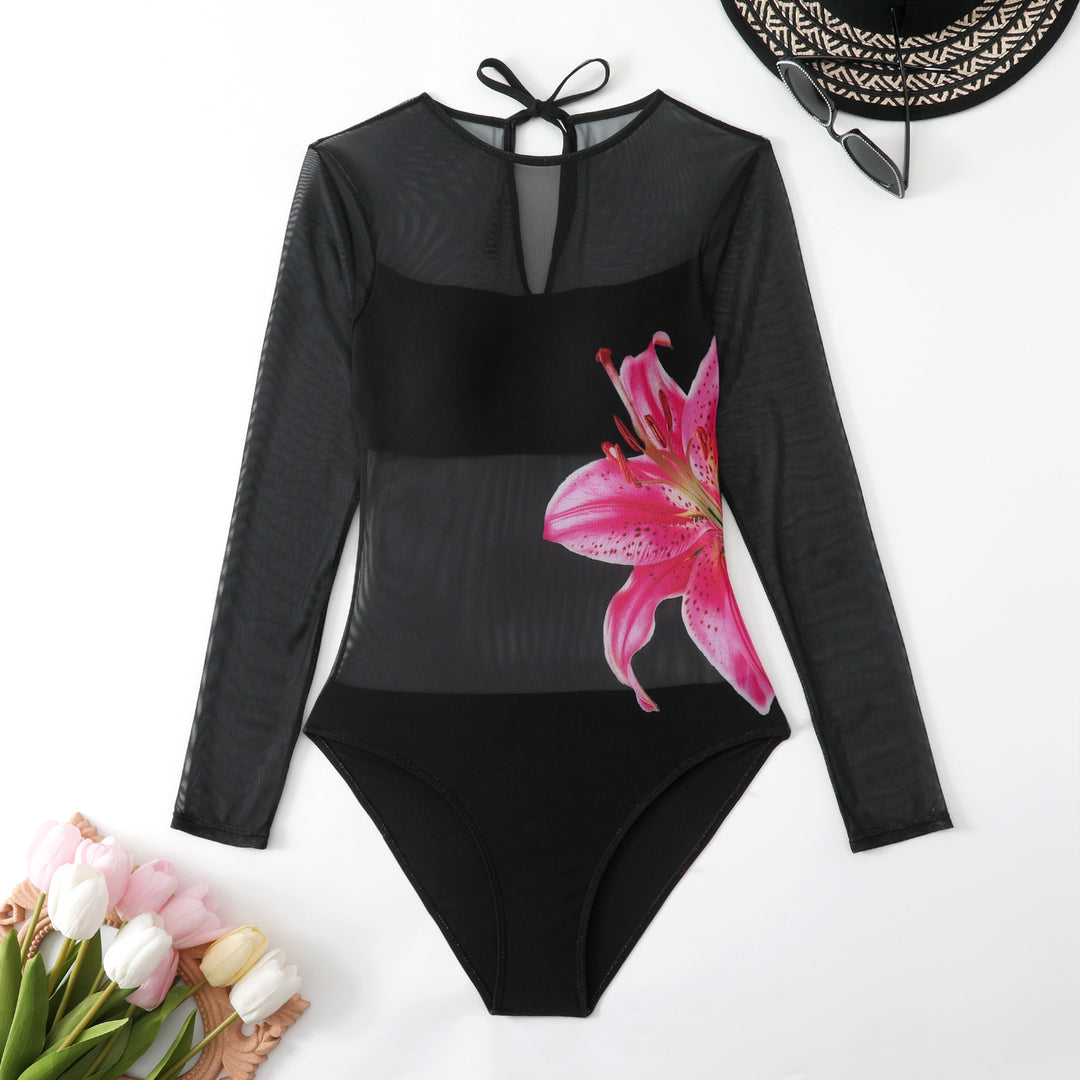 Women’s swimsuit with long sleeves and elegant floral design StylebySassy
