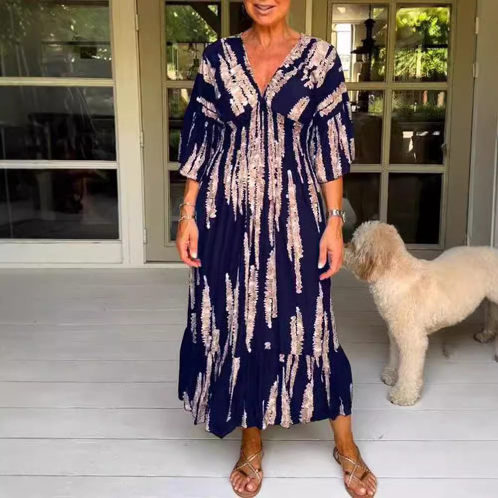 Women's maxi dress with V-neck, vertical brush print, gathered underbust seam and tiered ruffle skirt StylebySassy