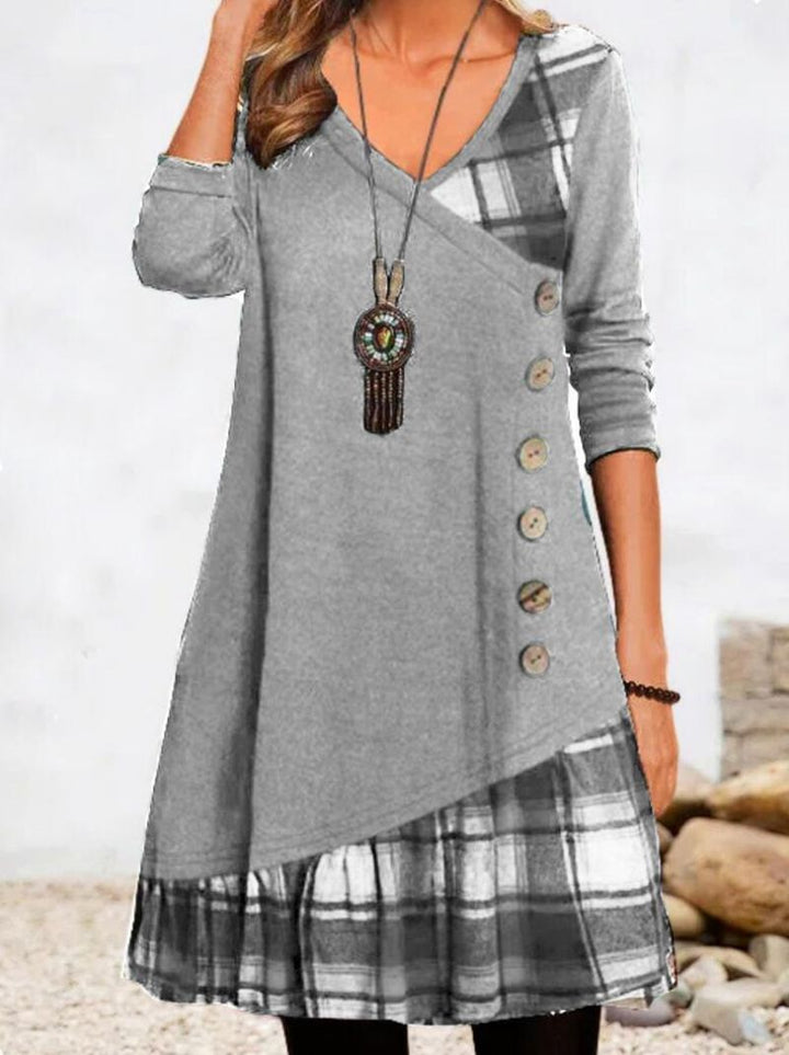 Women's asymmetrical V-neck tunic dress with decorative button placket and animal print trim StylebySassy