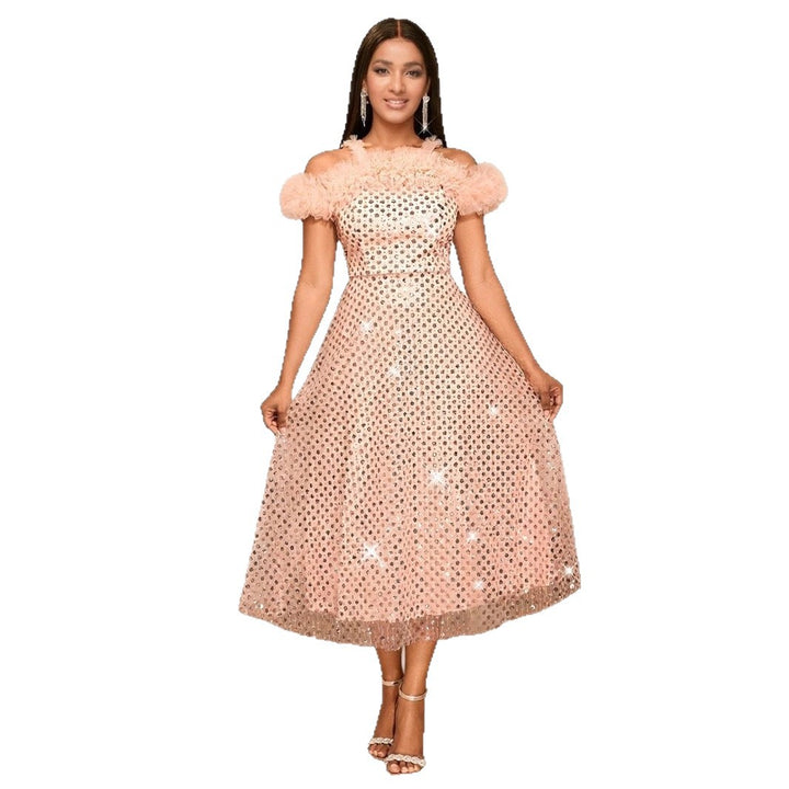 Women’s festive evening dress with voluminous ruffle details and delicate glitter StylebySassy