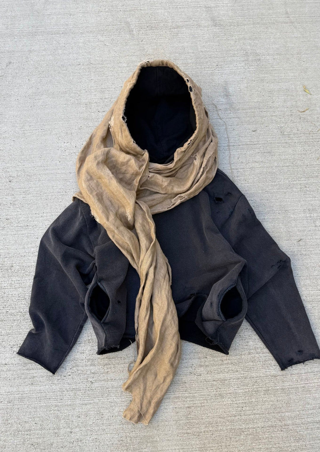 Unisex hooded pullover in usage marks style with attached tube scarf and frayed openings StylebySassy
