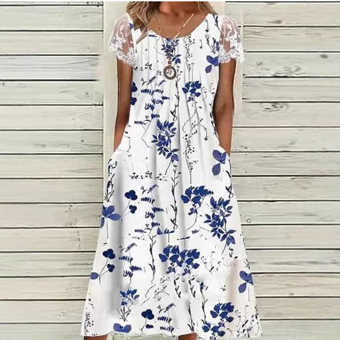 Ladies' airy A-line midi dress with lace sleeves, side pockets, and round neckline StylebySassy