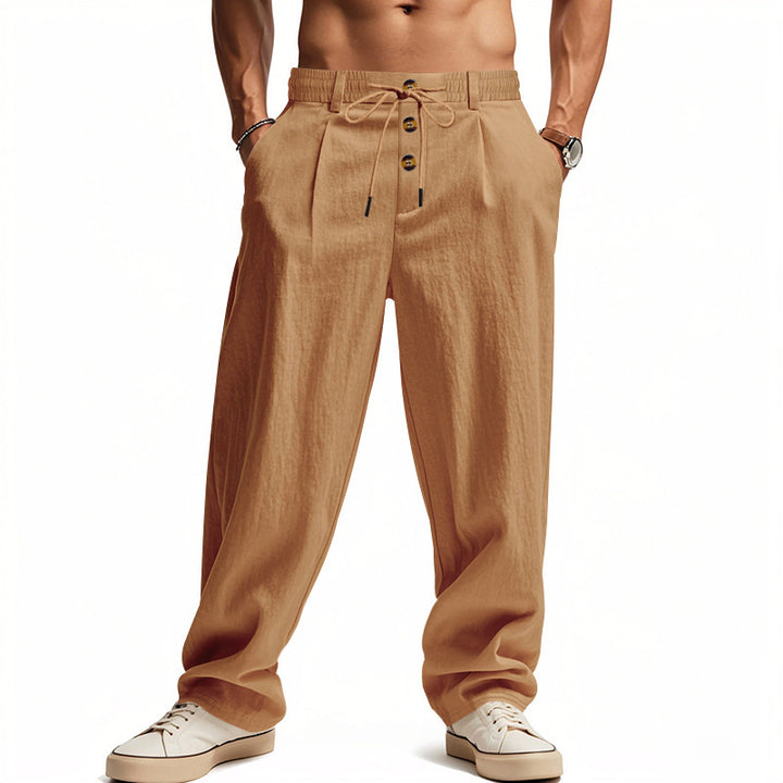 Men's casual pleated pants in linen look with elastic tunnel drawstring, decorative button placket, and deep side pockets StylebySassy