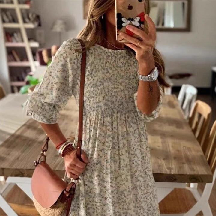 Women nan locker falling babydoll midi dress with gathered under bust, dropped three-quarter sleeves and fine floral print StylebySassy