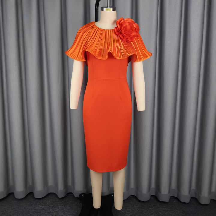 Women's form-fitting dress with voluminous collar and floral appliqué StylebySassy