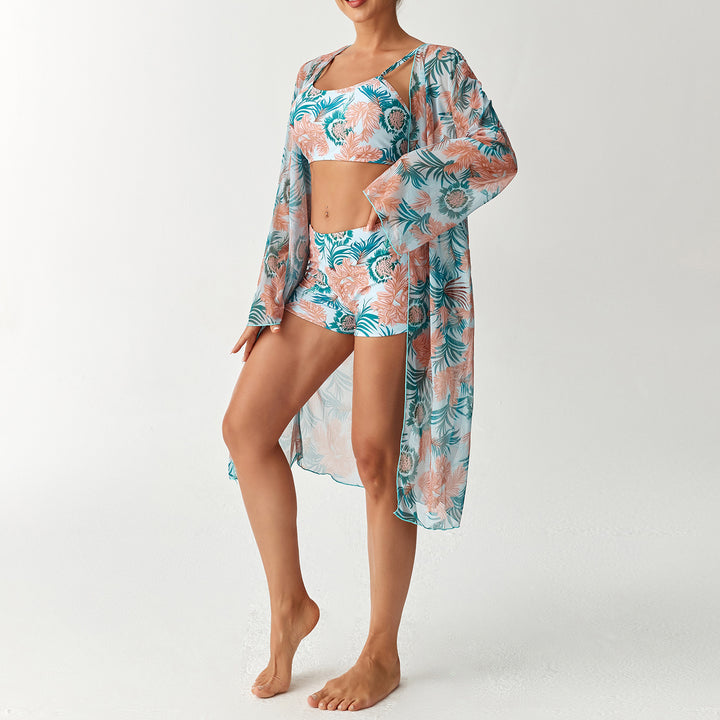 Women's beach outfit with floral design and transparent kaftan StylebySassy