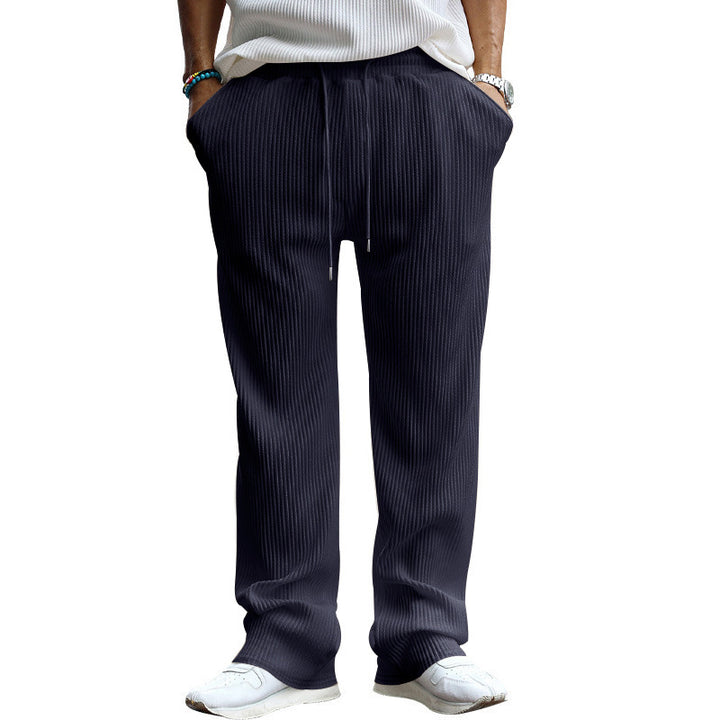 Men's straight cut corduroy velour pants with drawstring waistband, metal drawstring ends, and deep side pockets StylebySassy