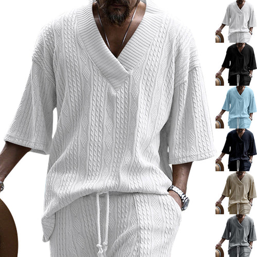 Women's short-sleeve knitted sweater in a loose fit with deep V-neck and cable pattern StylebySassy