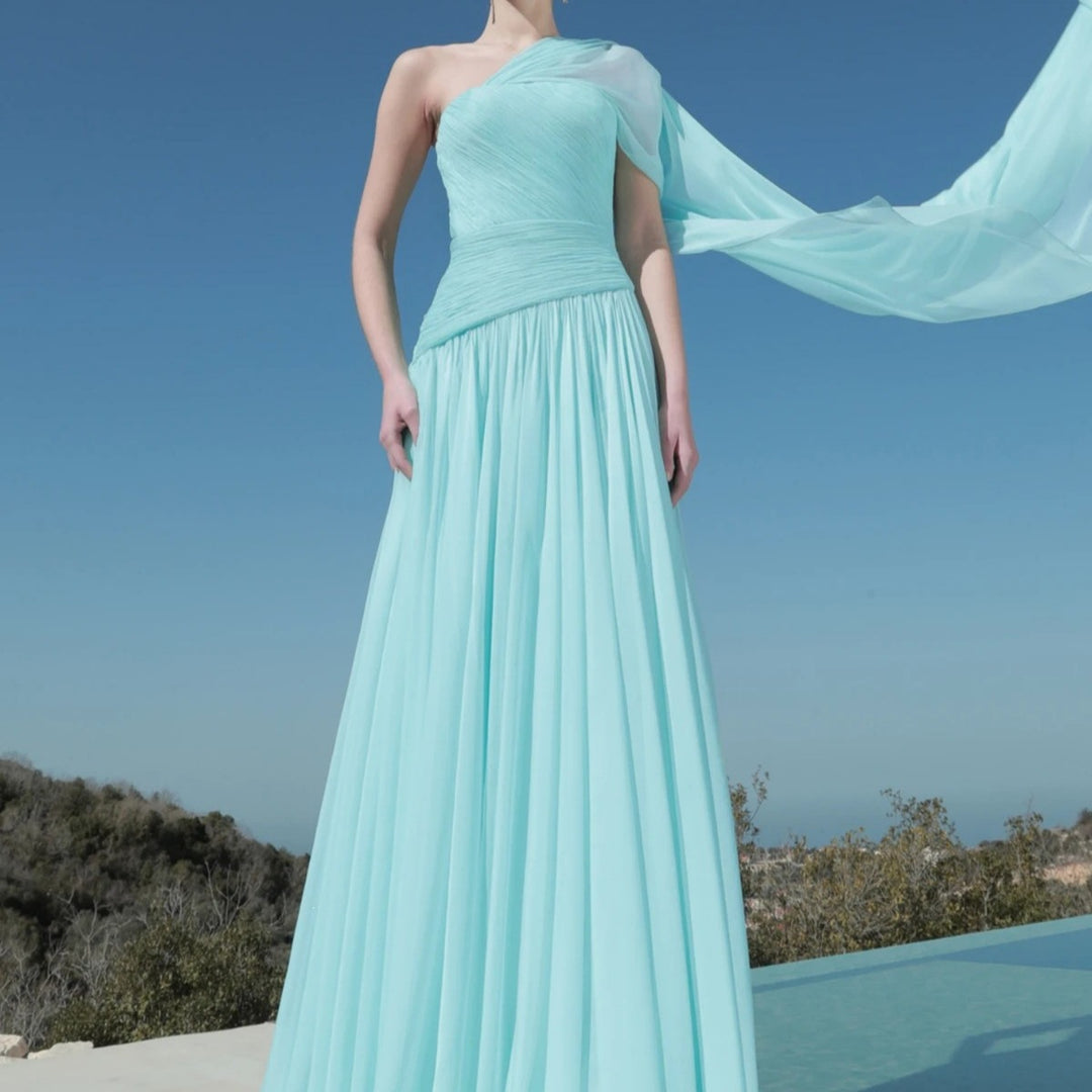 Women’s maxi dress with asymmetrical neckline and flowing fabric StylebySassy