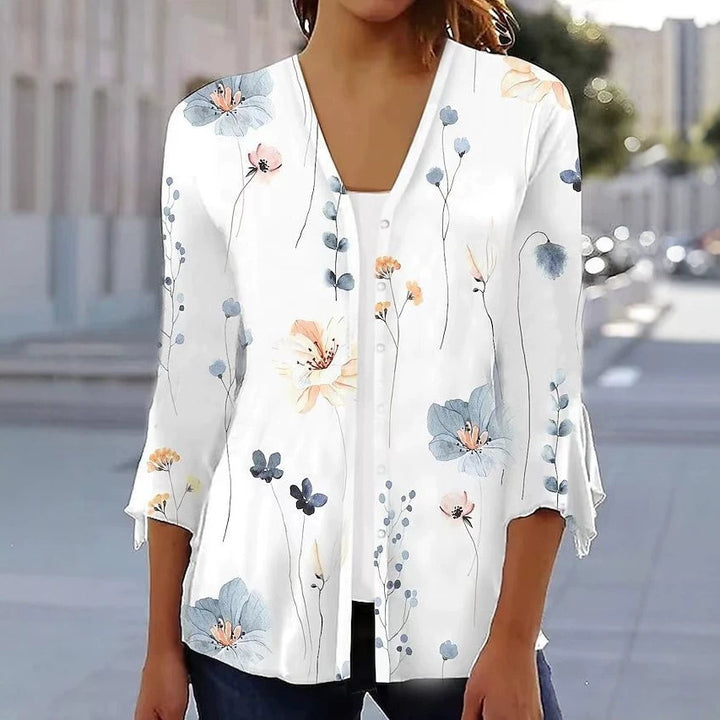 Women's light chiffon blouse with watercolor flower print, V-neck, button placket and three-quarter sleeves StylebySassy