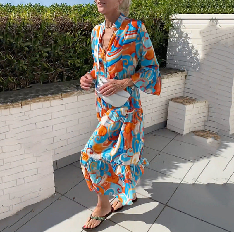 Women's airy maxi dress with watercolor print, V-neck, half button placket and tiered skirt StylebySassy