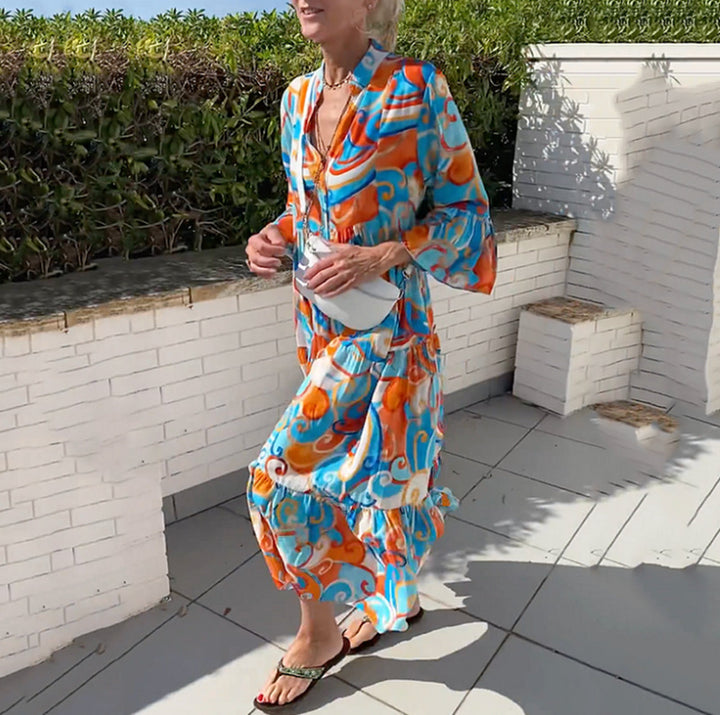 Women's airy maxi dress with watercolor print, V-neck, half button placket and tiered skirt StylebySassy