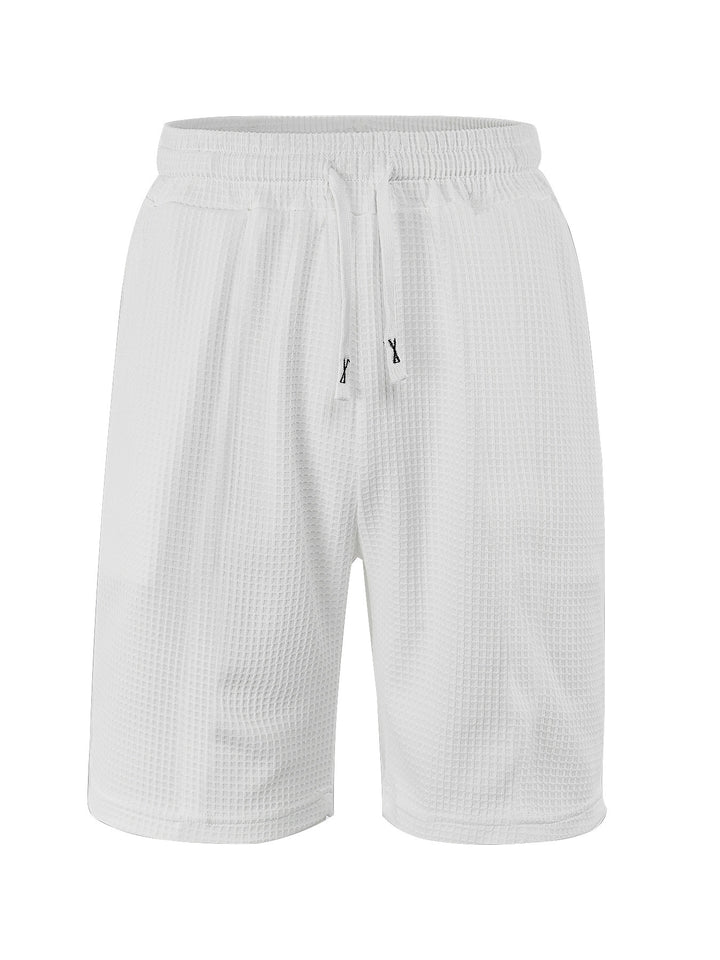 Men's breathable waffle pajama shorts with elastic comfort waistband, drawstring, and side pockets StylebySassy