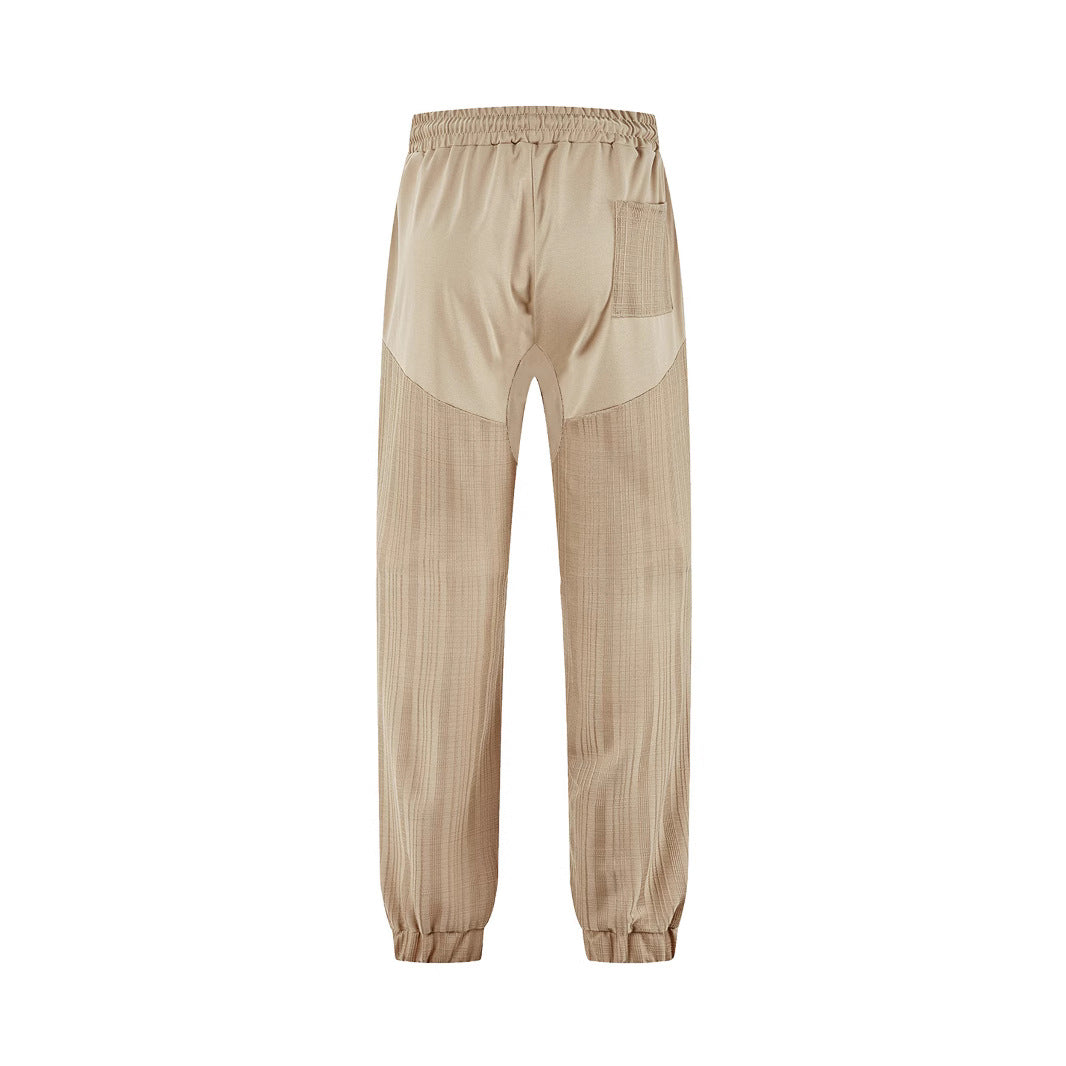 Men's slim-fit jogging pants with elastic drawstring waistband and textured knee panel StylebySassy