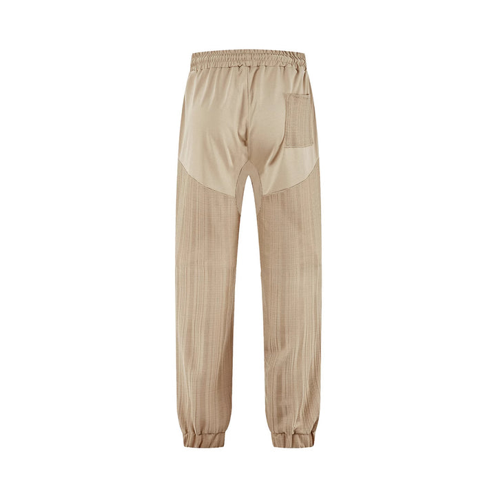 Men's slim-fit jogging pants with elastic drawstring waistband and textured knee panel StylebySassy