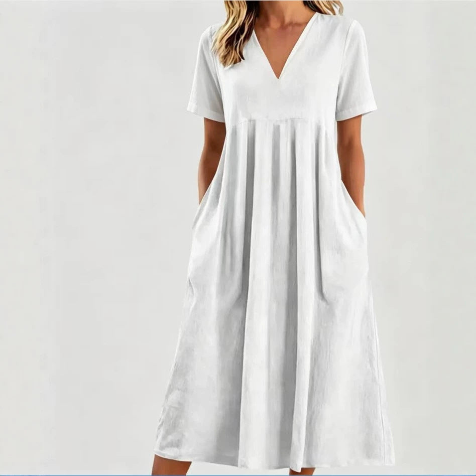 Women nan legeres V-neck midi dress with side pockets and gathered empire seam StylebySassy