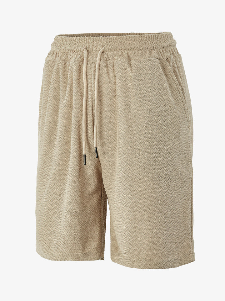 Men's terry shorts with herringbone texture, elastic drawstring waistband, and side pockets StylebySassy