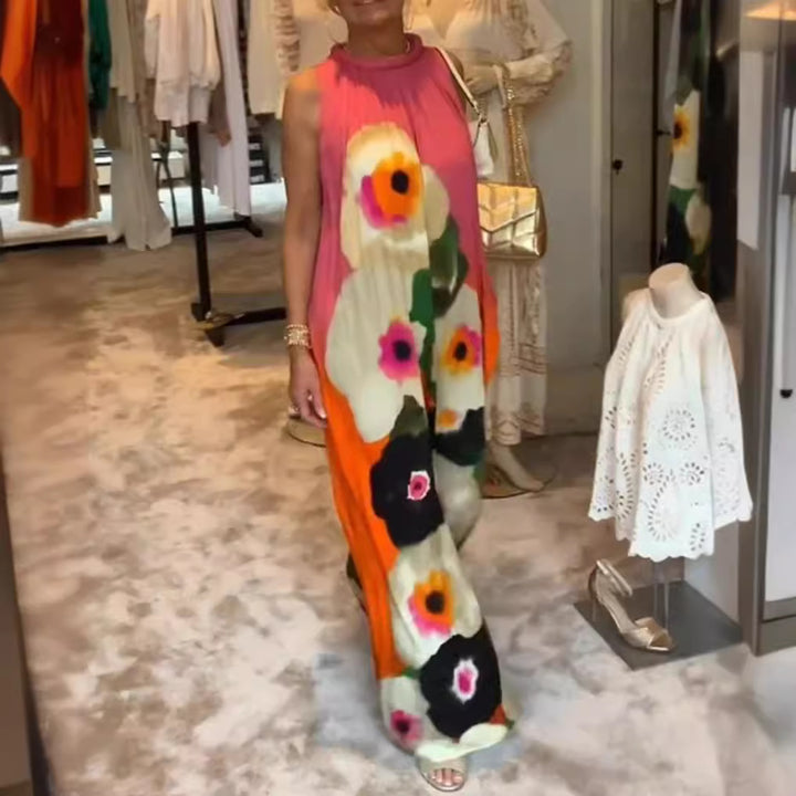 Women's sleeveless maxi dress with ruffled high collar, wide palazzo cut, and large floral print StylebySassy