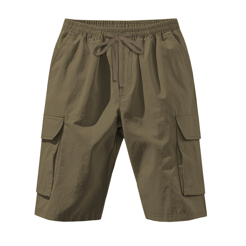 Men's knee-length utility shorts made of lightweight cotton blend with elastic drawstring waistband and patch flap pockets StylebySassy