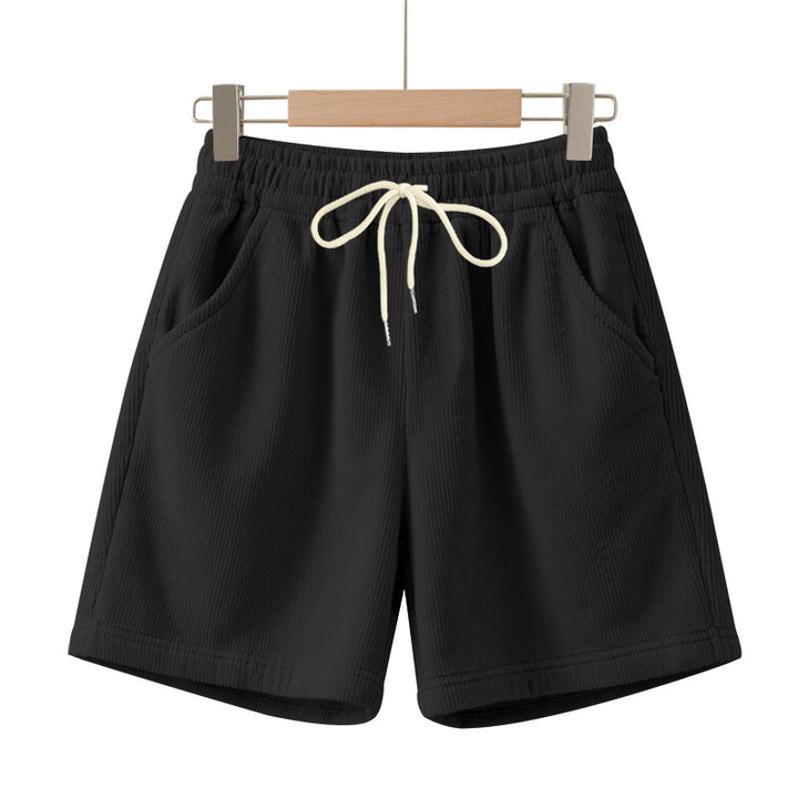 Men's ribbed jersey shorts with elastic waistband, decorative drawstring, and side slant pockets StylebySassy