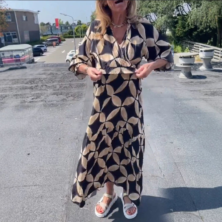 Women's maxi dress with geometric all-over print, smocked waist and ruffled tiers StylebySassy