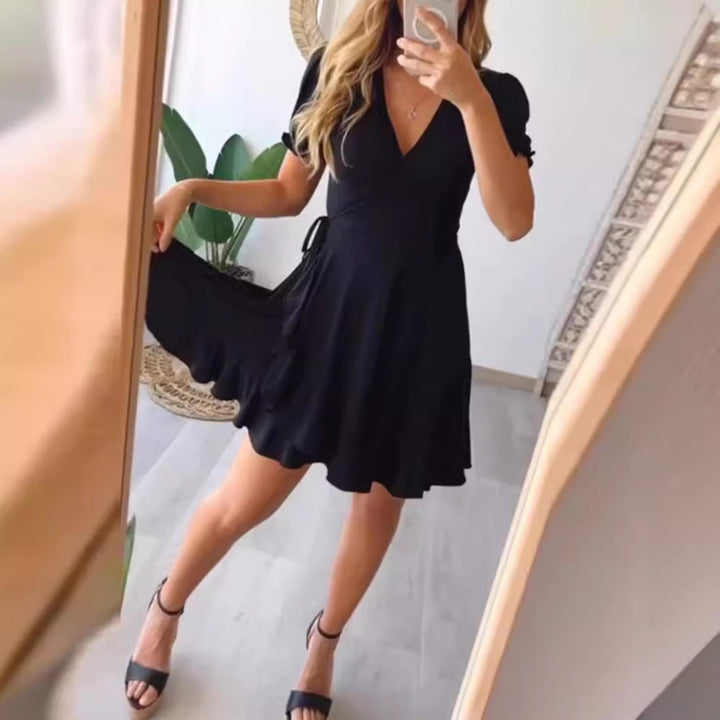 Women’s light wrap dress with V-neck, short sleeves, waist tie, and flounce skirt StylebySassy