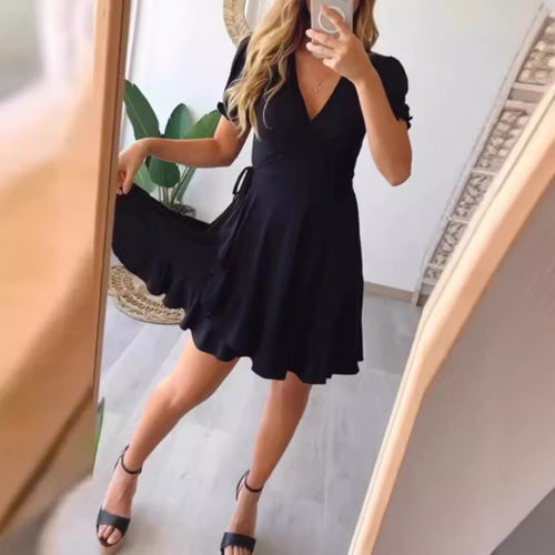 Women’s light wrap dress with V-neck, short sleeves, waist tie, and flounce skirt StylebySassy