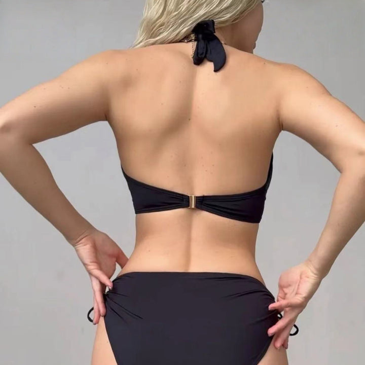 Women's triangle bikini with stylish cut and decorative closure StylebySassy