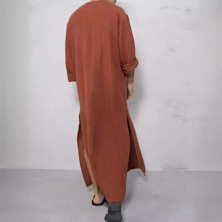 Men's wide long tunic-kaftan made of breathable linen with stand-up collar, button placket, and patch pockets StylebySassy