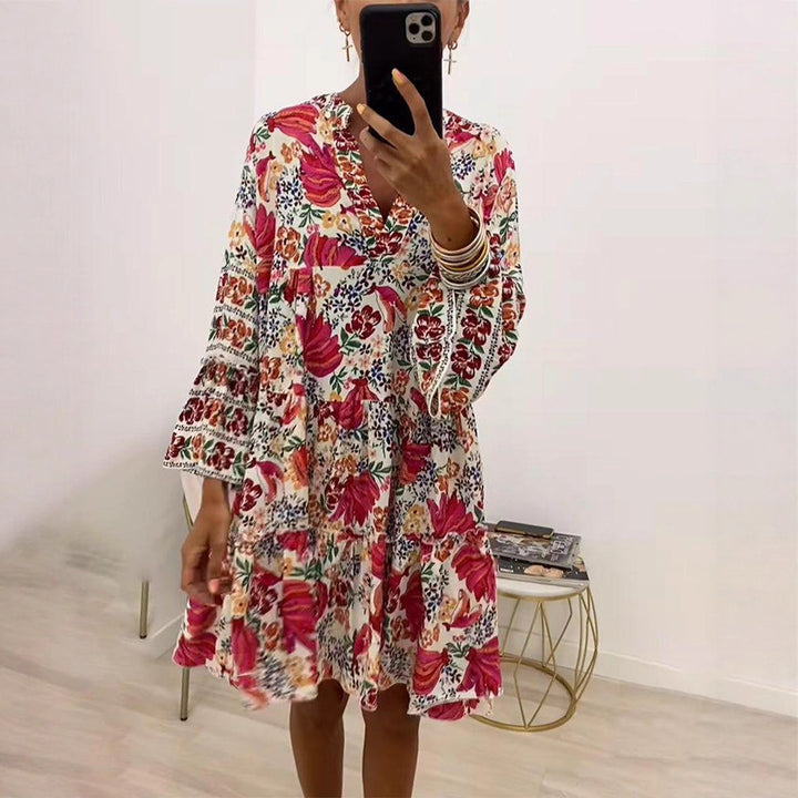 Women playful tunic tiered dress with deep V-neck, ruched bodice, ruffled tiers and ornamental embroidery trim StylebySassy