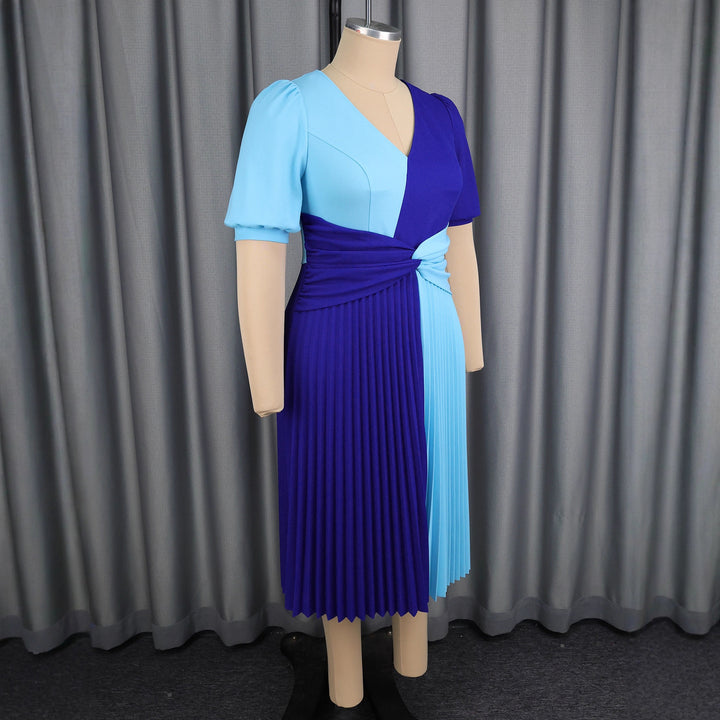 Women’s pleated midi dress with color block design and wrap look StylebySassy