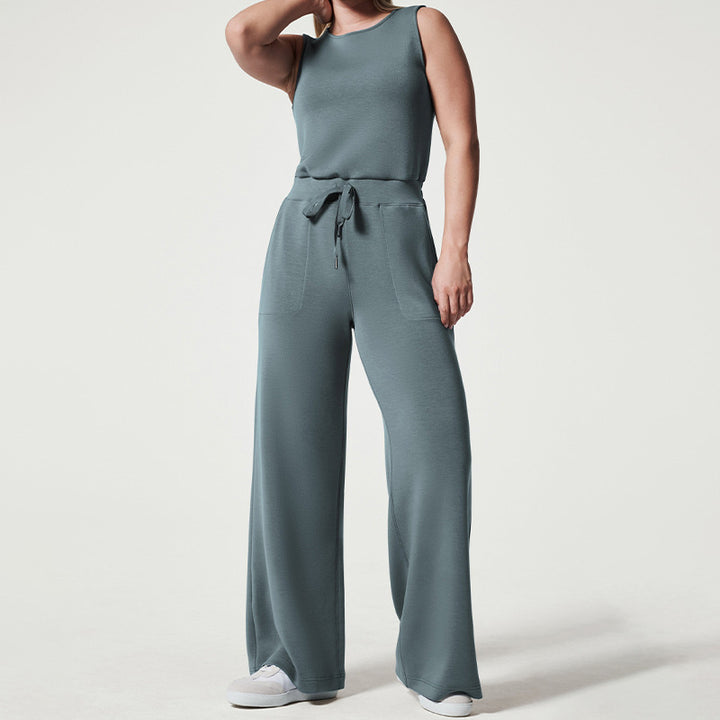 Women's sleeveless knitted jumpsuit with wide palazzo legs, drawstring waistband, and patch pockets StylebySassy