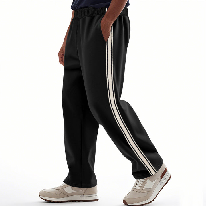 Men's loose Relax track pants in retro style with double side piping and elastic comfort waistband StylebySassy