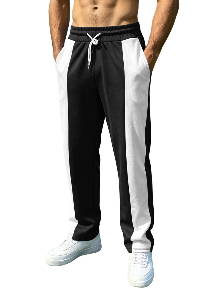 Men's sporty jogging pants with contrasting side inserts, elastic waistband, drawstring, and side pockets StylebySassy