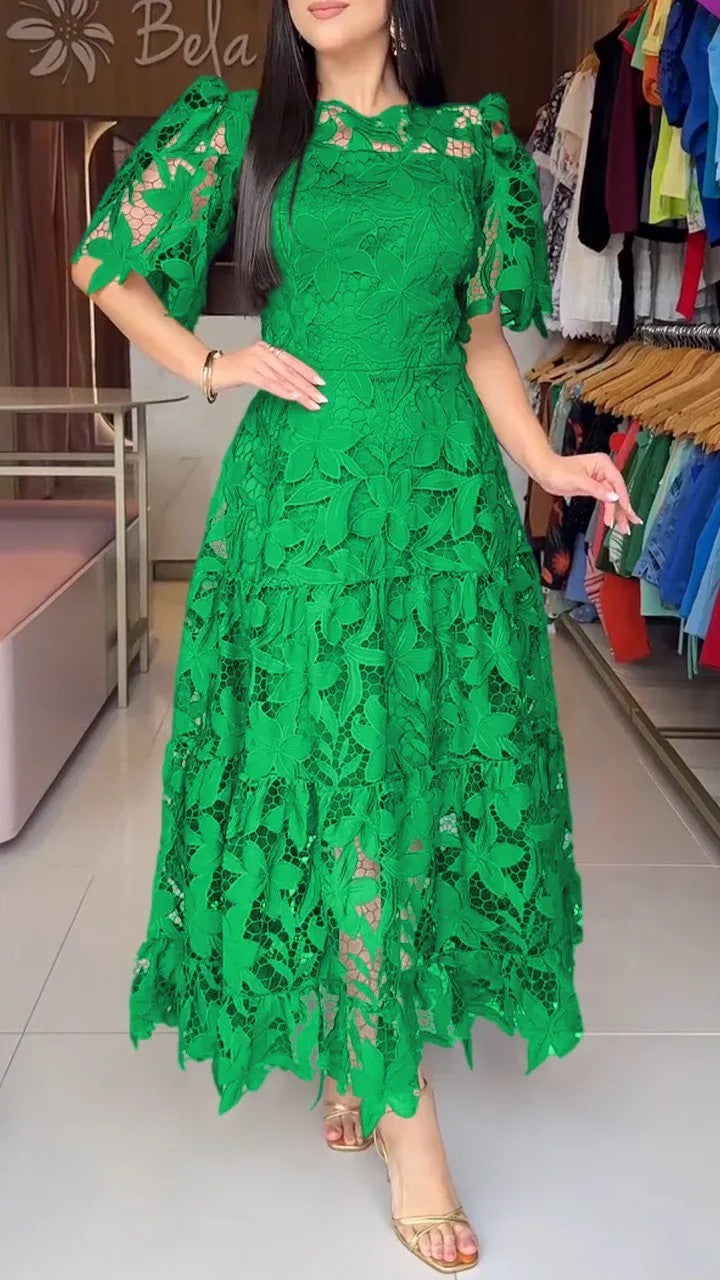 Women's maxi dress made of floral guipure lace with a fitted silhouette and tiered hem StylebySassy