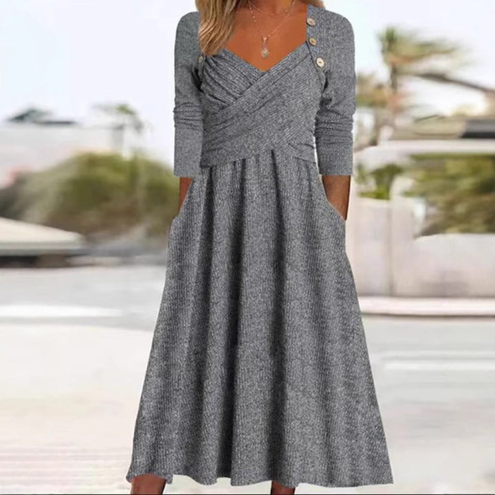 Women's knitted maxi dress with wrap top V-neck, side pockets and decorative button placket StylebySassy