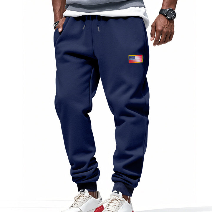 Men's slim-fit sweatpants with tapered leg, elastic drawstring waistband, and discreet flag application StylebySassy