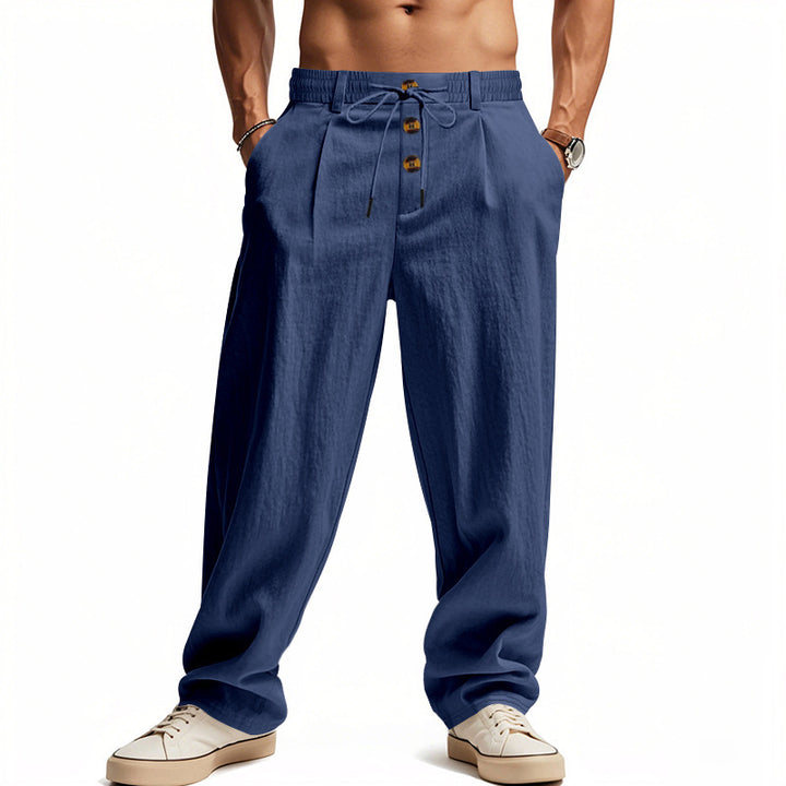 Men's casual pleated pants in linen look with elastic tunnel drawstring, decorative button placket, and deep side pockets StylebySassy