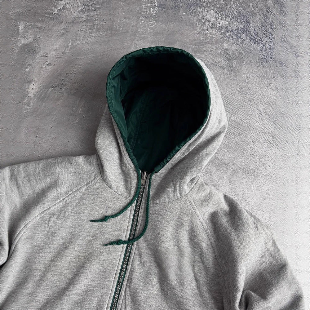 Unisex non-fitted windbreaker with hood padded fleece lining drawstring hem and decorative stripes on sleeves StylebySassy